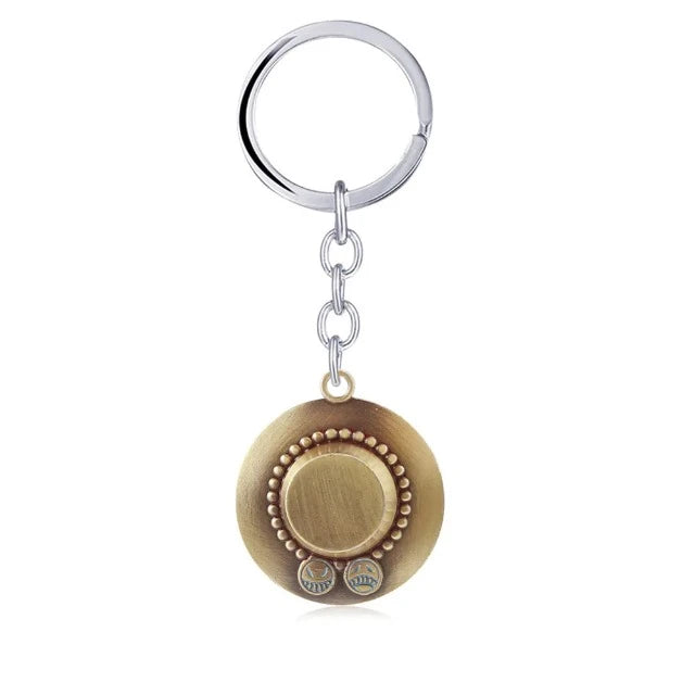 Porte-Clés One Piece Ace aux Poings Ardents Or