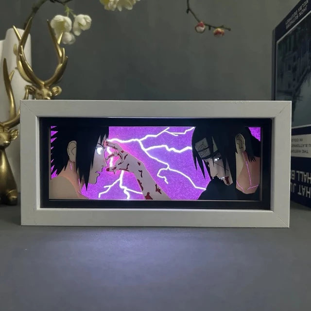 Cornice luminosa Sasuke e Itachi